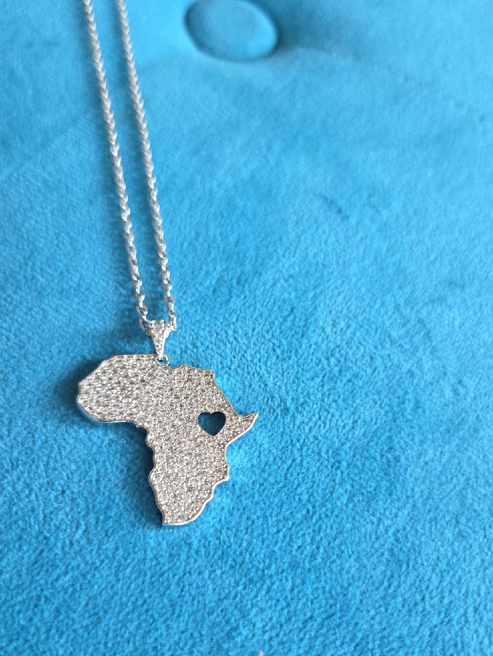 Silver Africa Map Pendant Necklace with Heart Accent